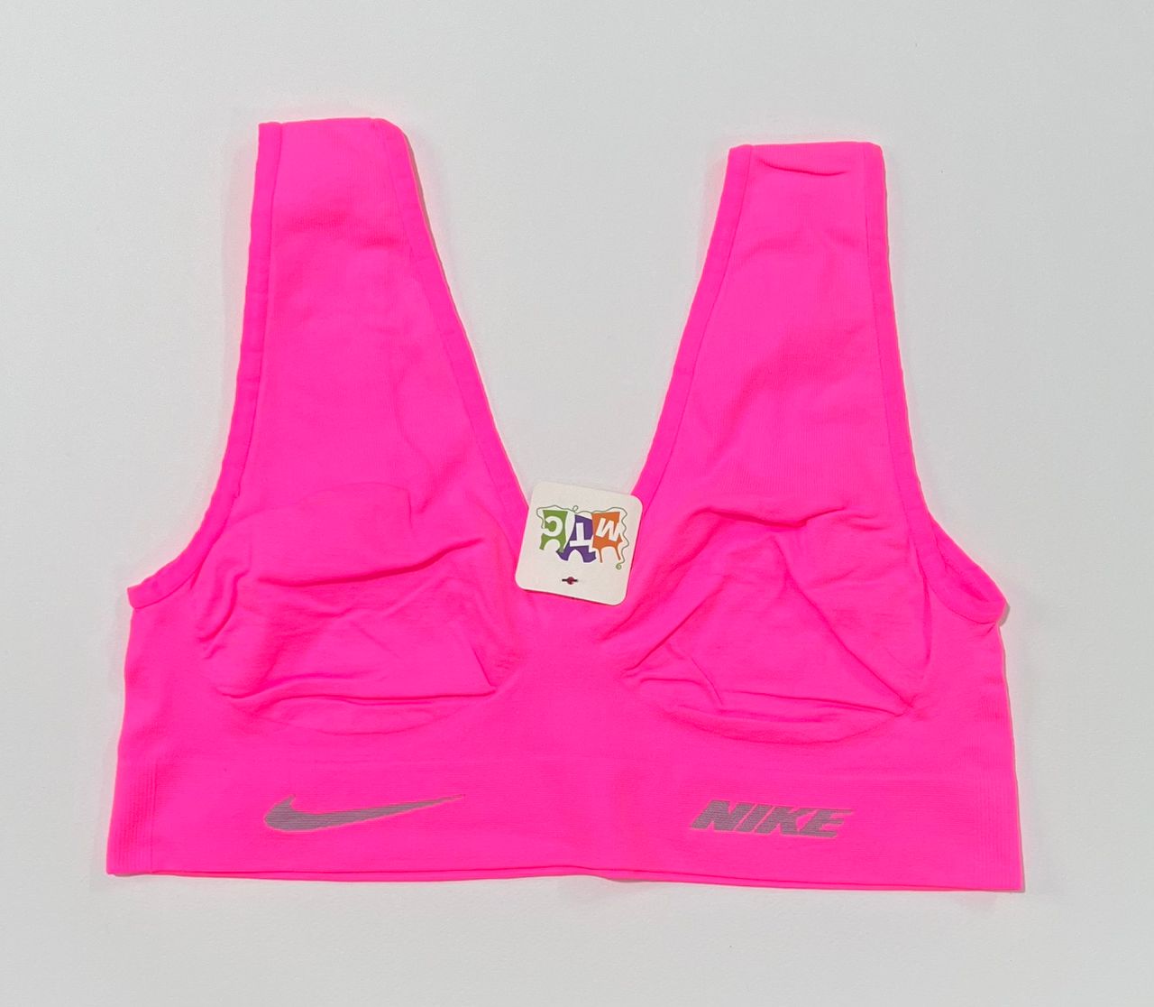 neon-pink-nike-gym-top-front-view.jpg تاپ نیمتنه ورزشی نایک رنگ صورتی نئونی مناسب باشگاه و یوگا