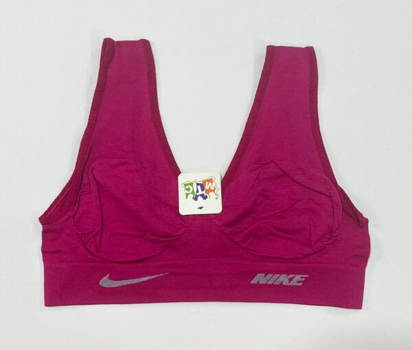 نیم‌تنه ورزشی نایک زنانه رنگ سرخابی تیره مدل سیملس (بدون درز)