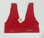 نیم‌تنه ورزشی نایک زنانه رنگ قرمز لاکی مدل کبریتی و جذب